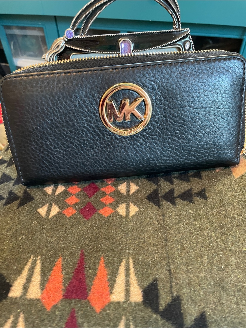 Michael Kors Black Pebbled Leather Zip-Around Wallet with Gold MK Emblem